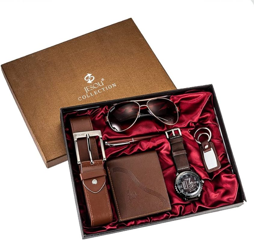 Everyday carry essentials for men laid out including watch, wallet, and keys