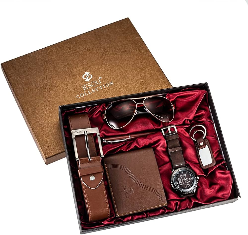 Everyday carry essentials for men laid out including watch, wallet, and keys