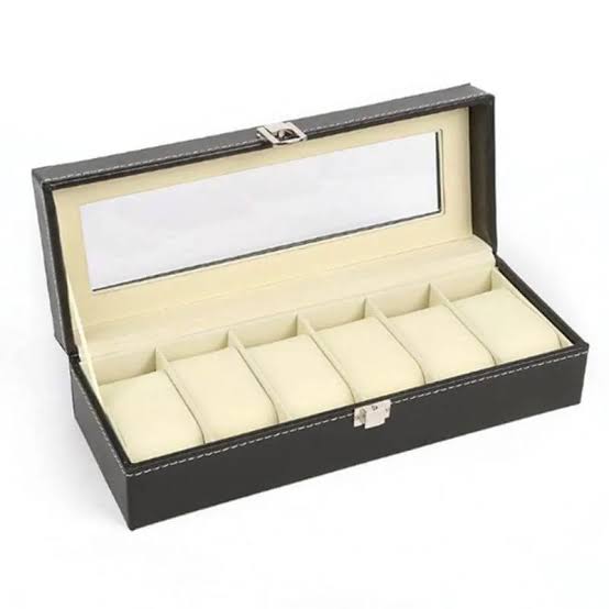 Wooden watch organizer box with multiple watches on cushioned slots